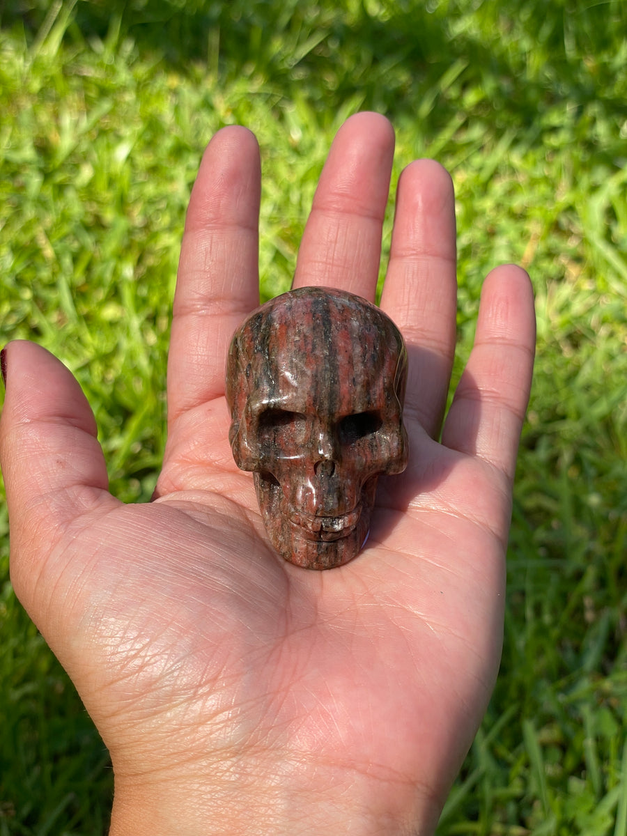 Red jasper black tourmaline and Quartz skull carving