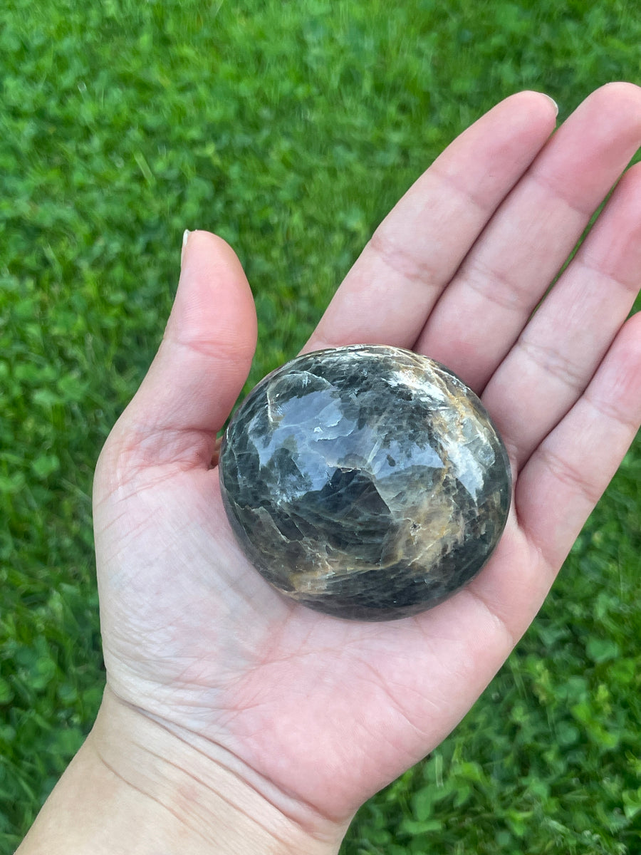 Black moonstone palm stone