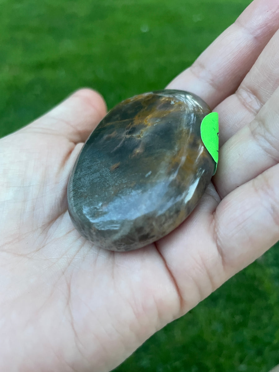 Black moonstone palm stone