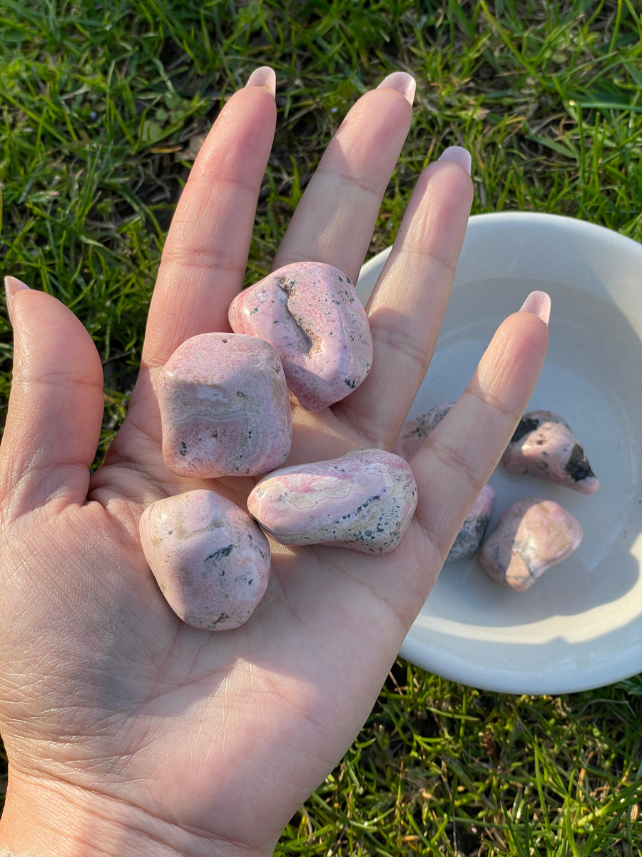 Rhodonite tumbles