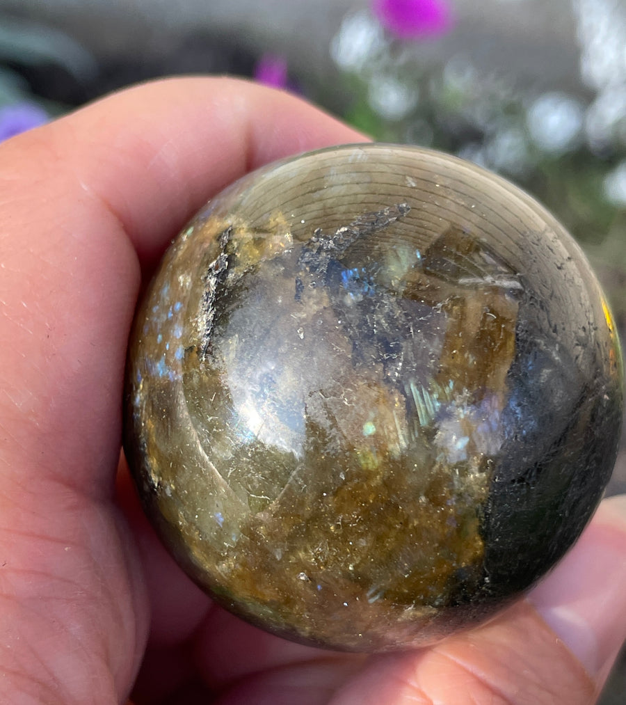 Labradorite sphere with flash