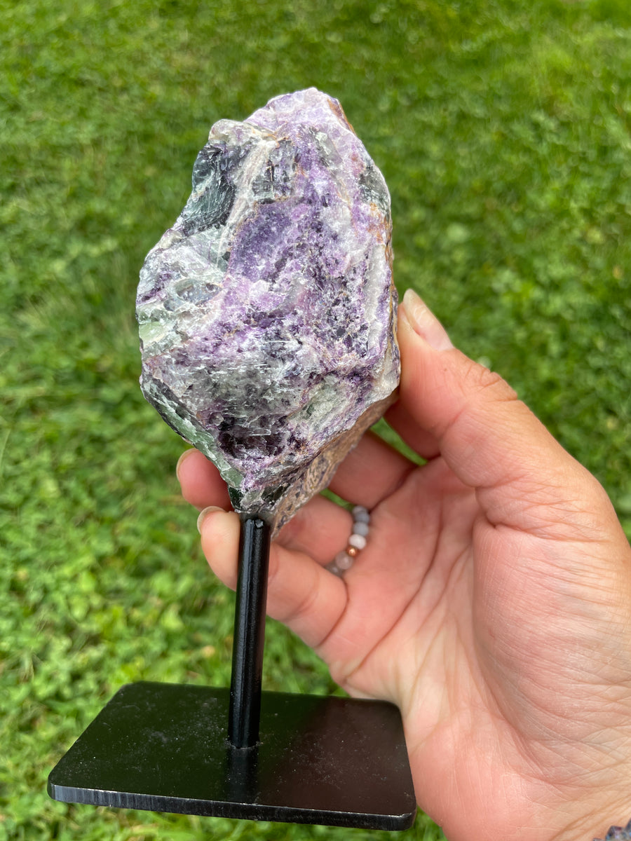 Raw Fluorite specimen on stand