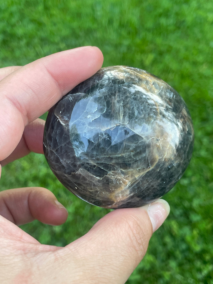 Black moonstone palm stone