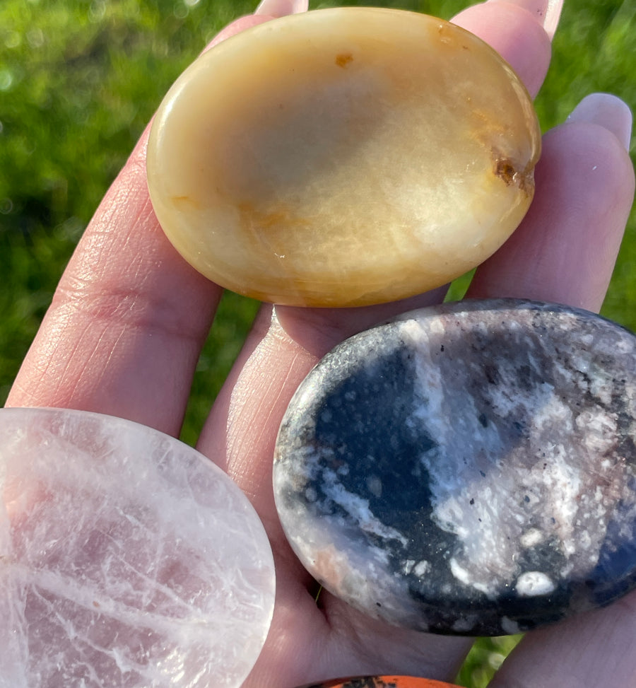 Stress relief pocket worry stone sodalite and mahogany obsidian left