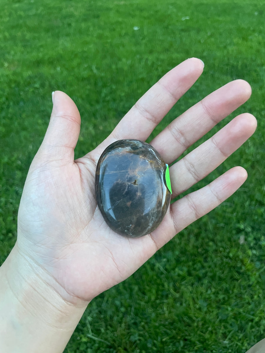 Black moonstone palm stone