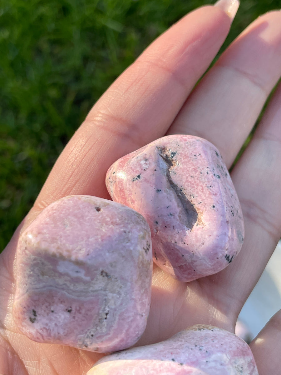 Rhodonite tumbles