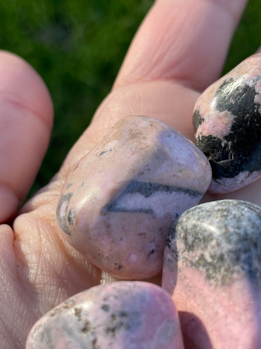 Rhodonite tumbles