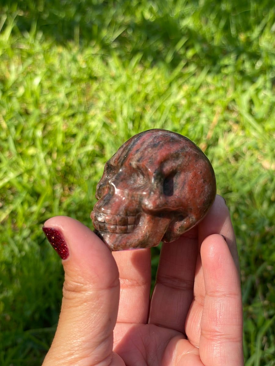 Red jasper black tourmaline and Quartz skull carving