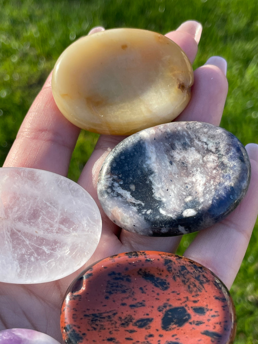 Stress relief pocket worry stone sodalite and mahogany obsidian left