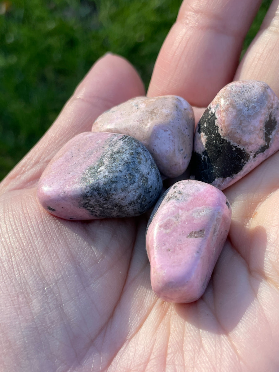 Rhodonite tumbles