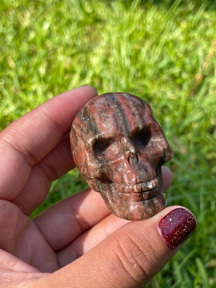 Red jasper black tourmaline and Quartz skull carving