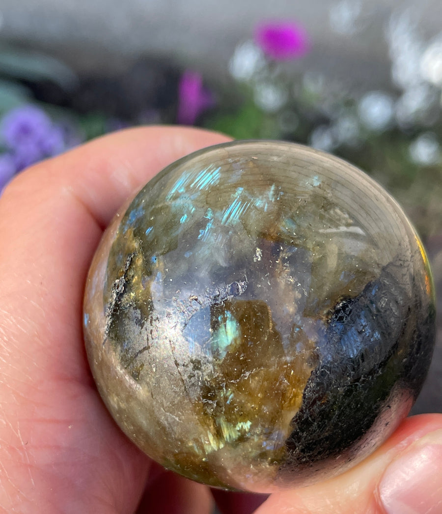 Labradorite sphere with flash