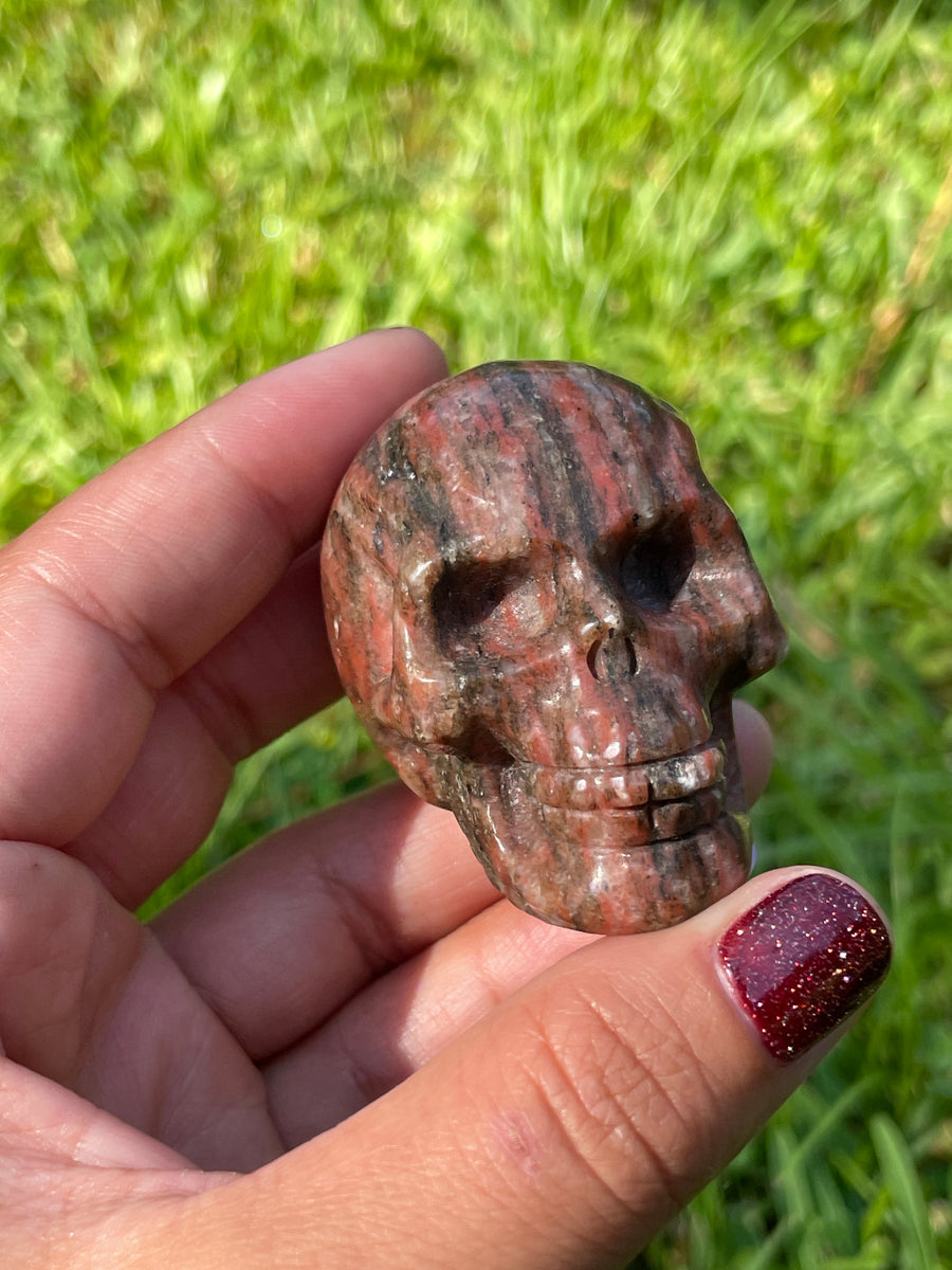 Red jasper black tourmaline and Quartz skull carving