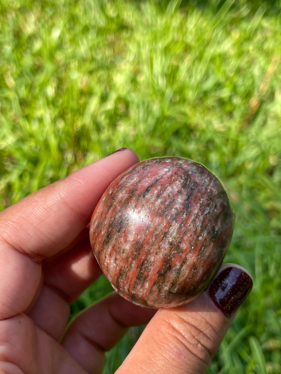 Red jasper black tourmaline and Quartz skull carving