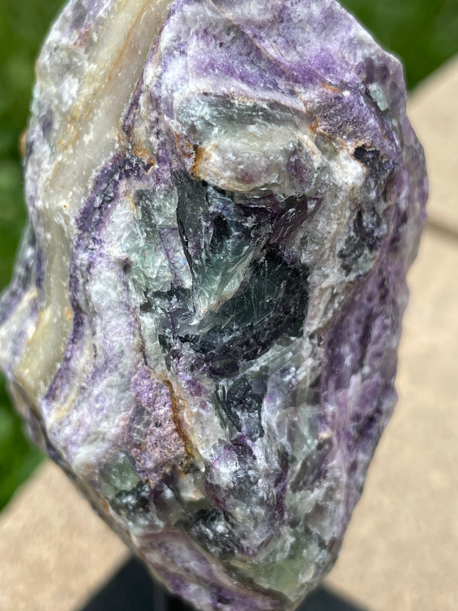 Raw Fluorite specimen on stand