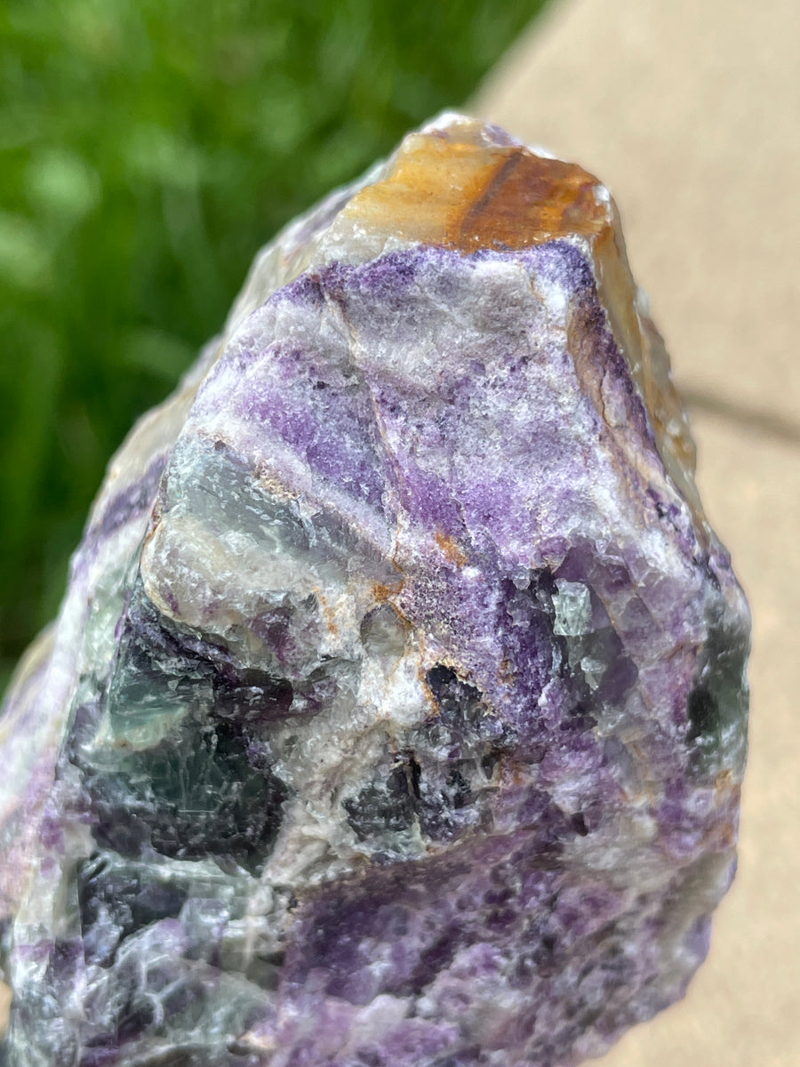 Raw Fluorite specimen on stand