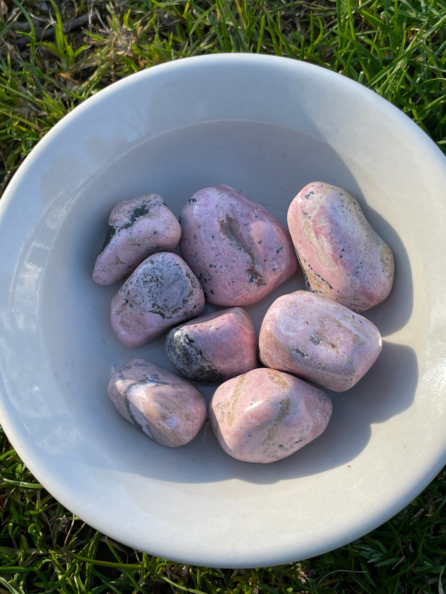 Rhodonite tumbles