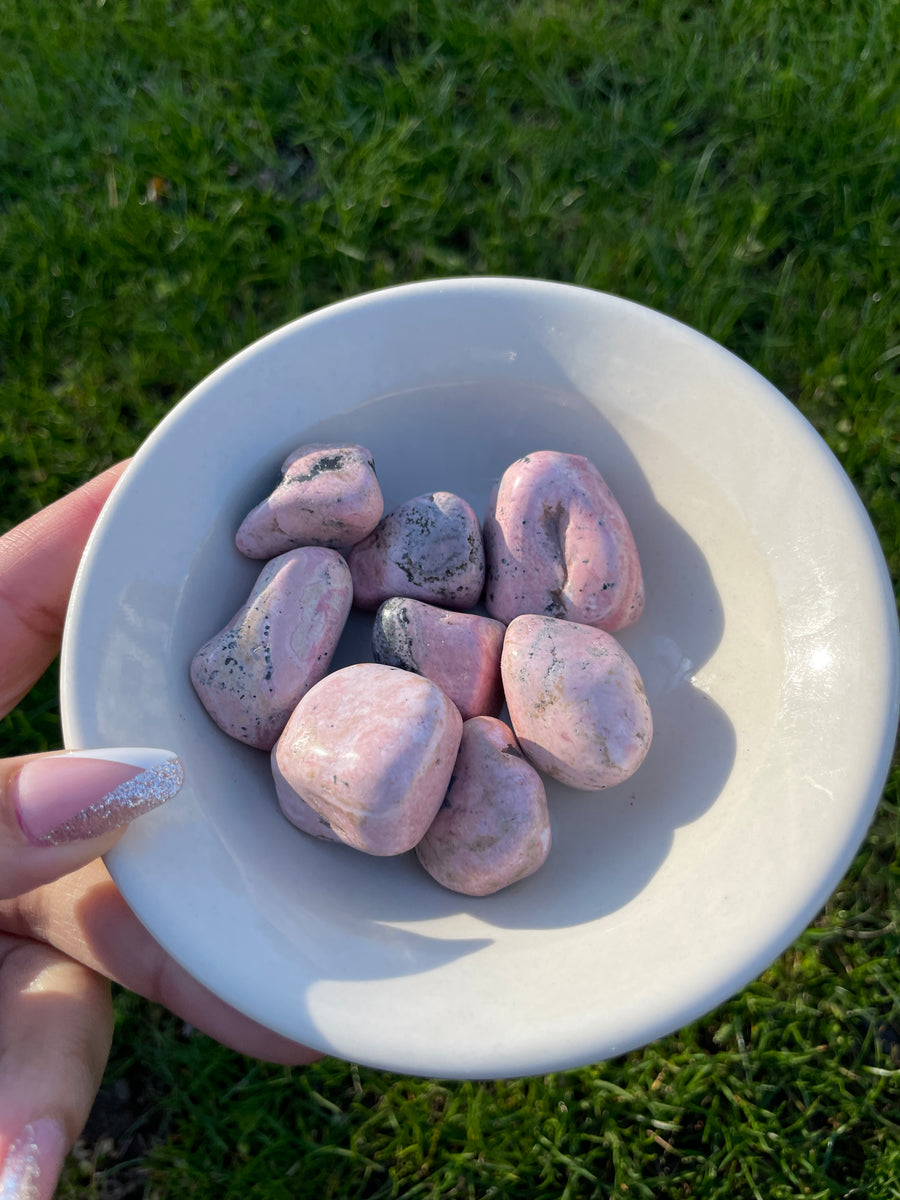 Rhodonite tumbles