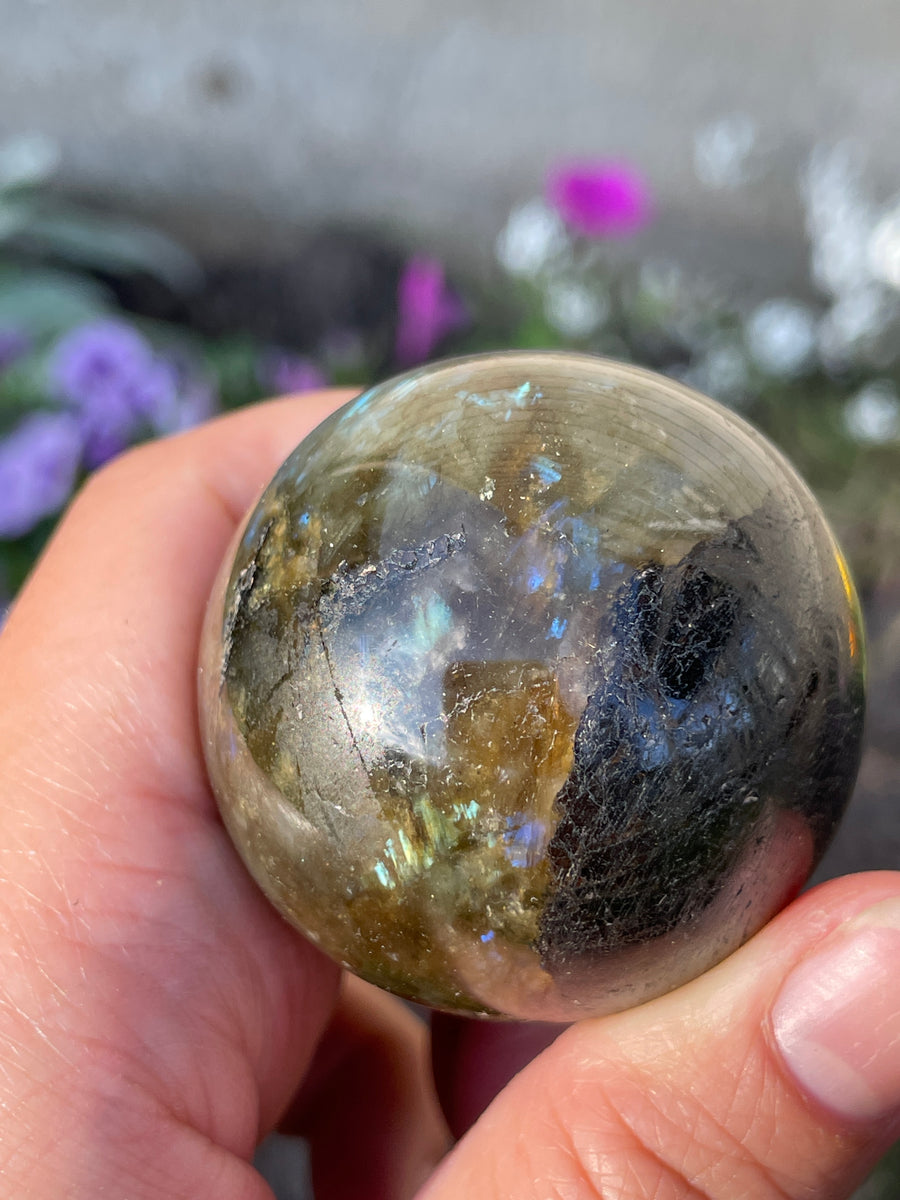 Labradorite sphere with flash