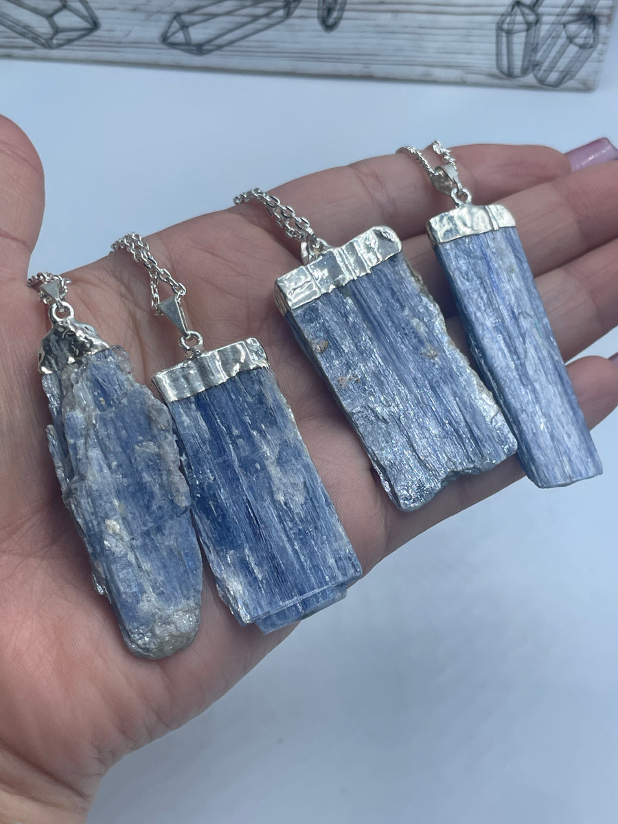 Blue kyanite and Clear Quartz silver trim pendant on stainless steel chain