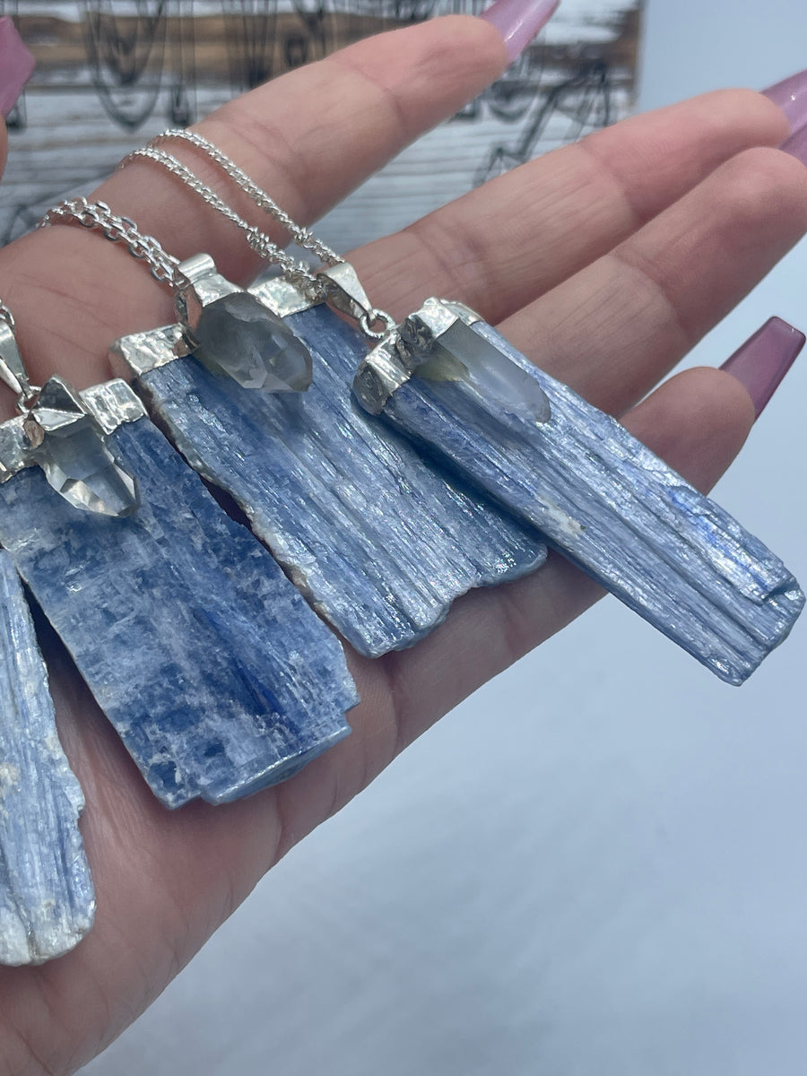 Blue kyanite and Clear Quartz silver trim pendant on stainless steel chain